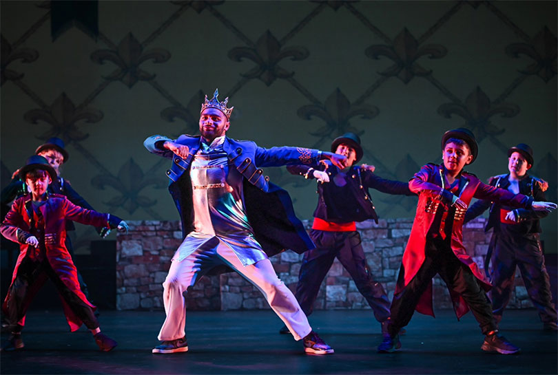 A boys hip hop crew perform in the production of Rapunzel